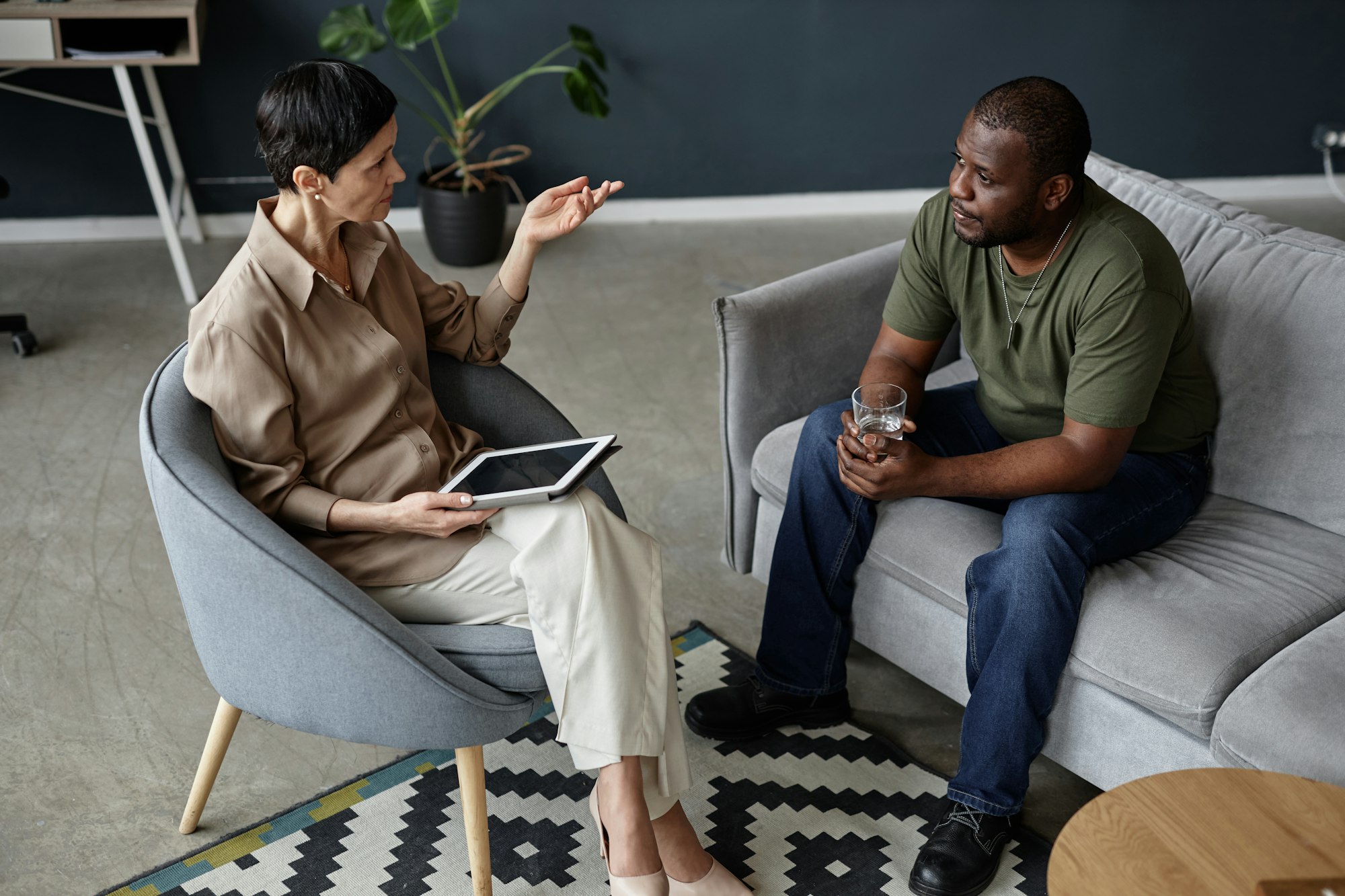 Psychologist Consulting Soldier in Therapy Session