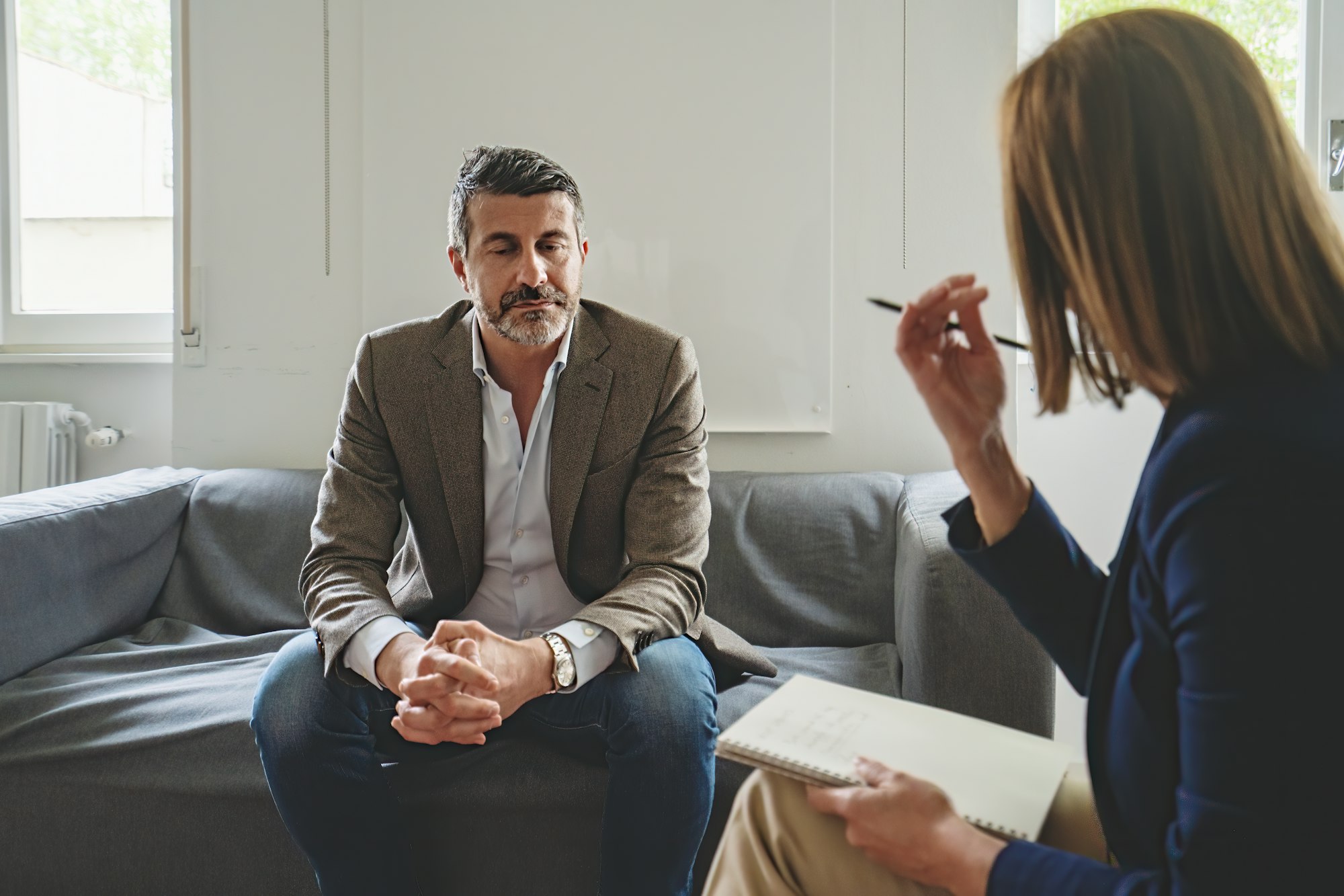 Man in Anxiety Therapy Session with therapist in Charlotte